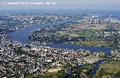 Picture: Rostock: city centre with old port (centre-front) and seaside-resort Warnemünde (top-right) with new sea-port. The town stretches along the river Warnow.