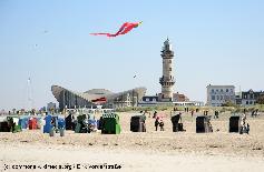 Picture: Rostock-Warnemünde old lighthouse and "Teepott". The lighthouse is still in operation and serves also as sightseeing platform for tourists.