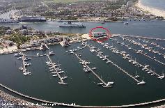 Picture: "Yachthafenresidenz Hohe Düne" with congress centre and marina (front). Warnemünde with cruise terminal, ferries to Scandinavia and beach (background).