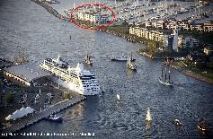 Picture: Warnemünde cruise terminal (lower-left) and "Yachthafenresidenz Hohe Düne" with congress centre and marina (upper-right). Passenger ferry crossing the river (centre). This ferry connects to the railway station.